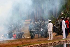 Kenyan military gives a gun salute in a past event.