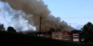 A burning dormitory at Karima Boys