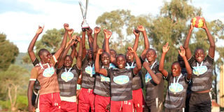 St Luke’s Kimilili Boys High School captain Emmanuel Chesebe leads teammates in celebration 