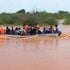 A boat crossing a flooded area from Madogo to Garissa town